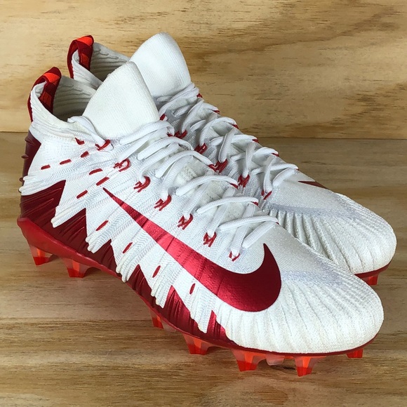 white and red football cleats